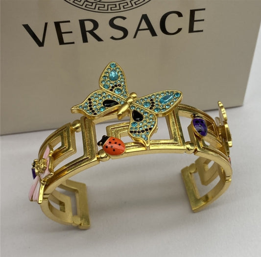 Versage bracelet dua lipa earrings set